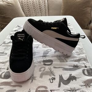 Puma thick sole sneakers.